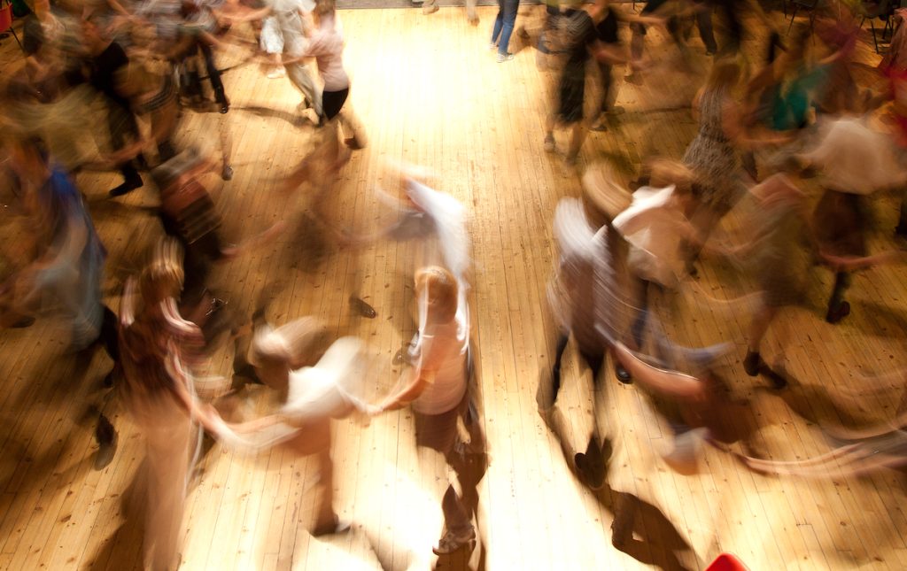 Ceilidh dancers whirling round the floor